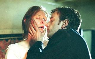 Ewan prepares to rip off Tilda's wig and shout 'She's a man, baby!'